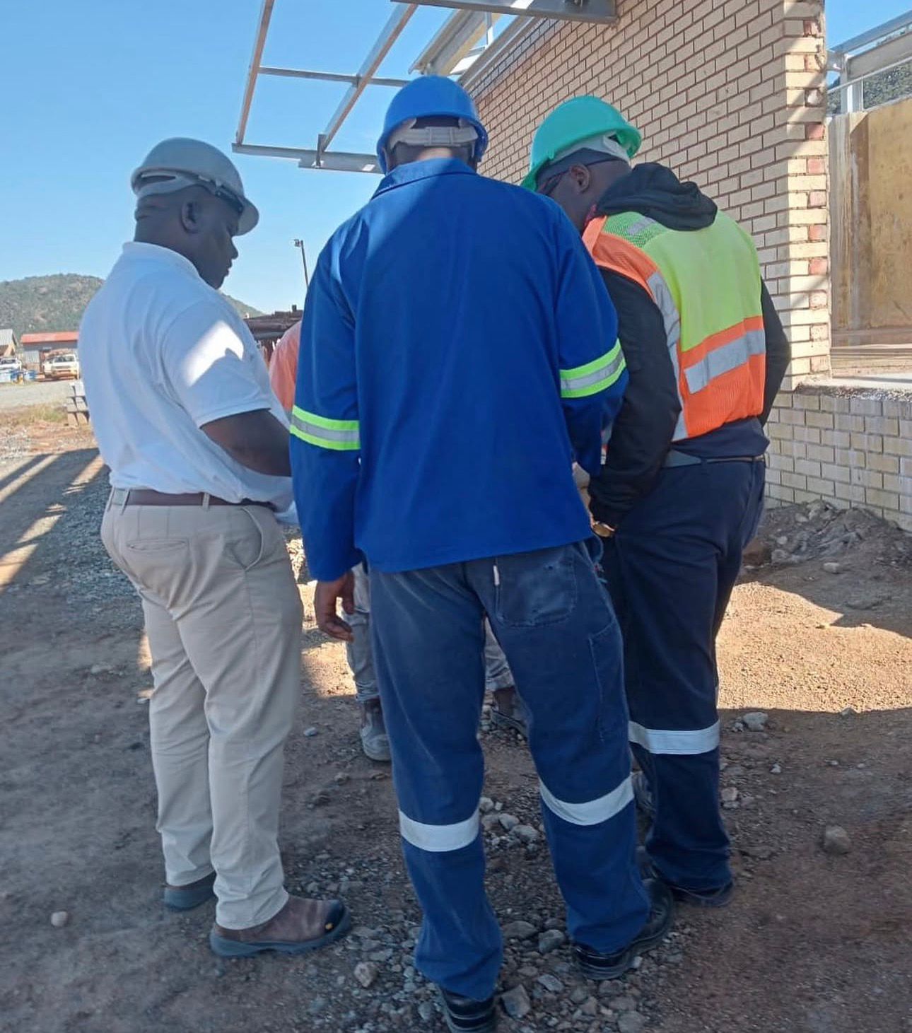 Project team reviewing construction details